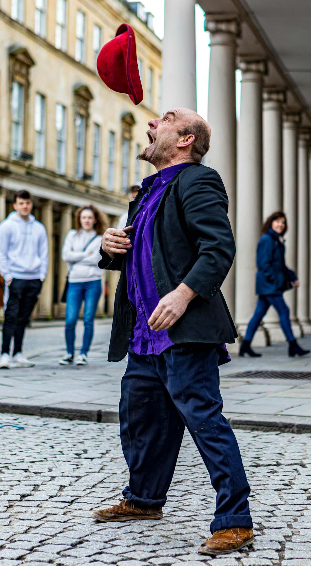 person smiling in crowd