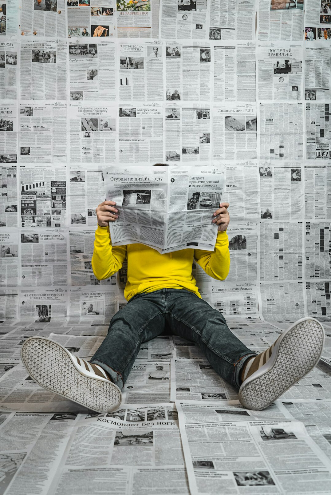 person reading newspaper